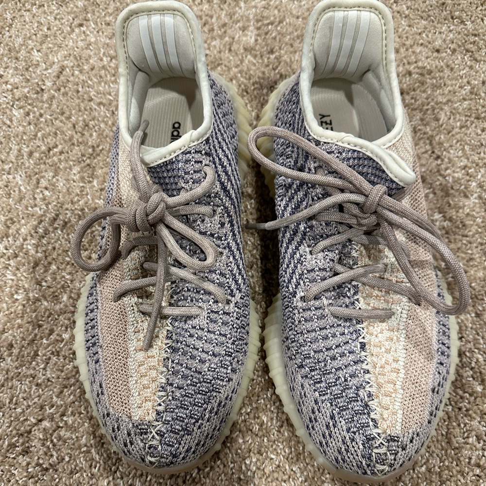 Adidas Yeezy Boost men size 6.5, about a woman size 8
